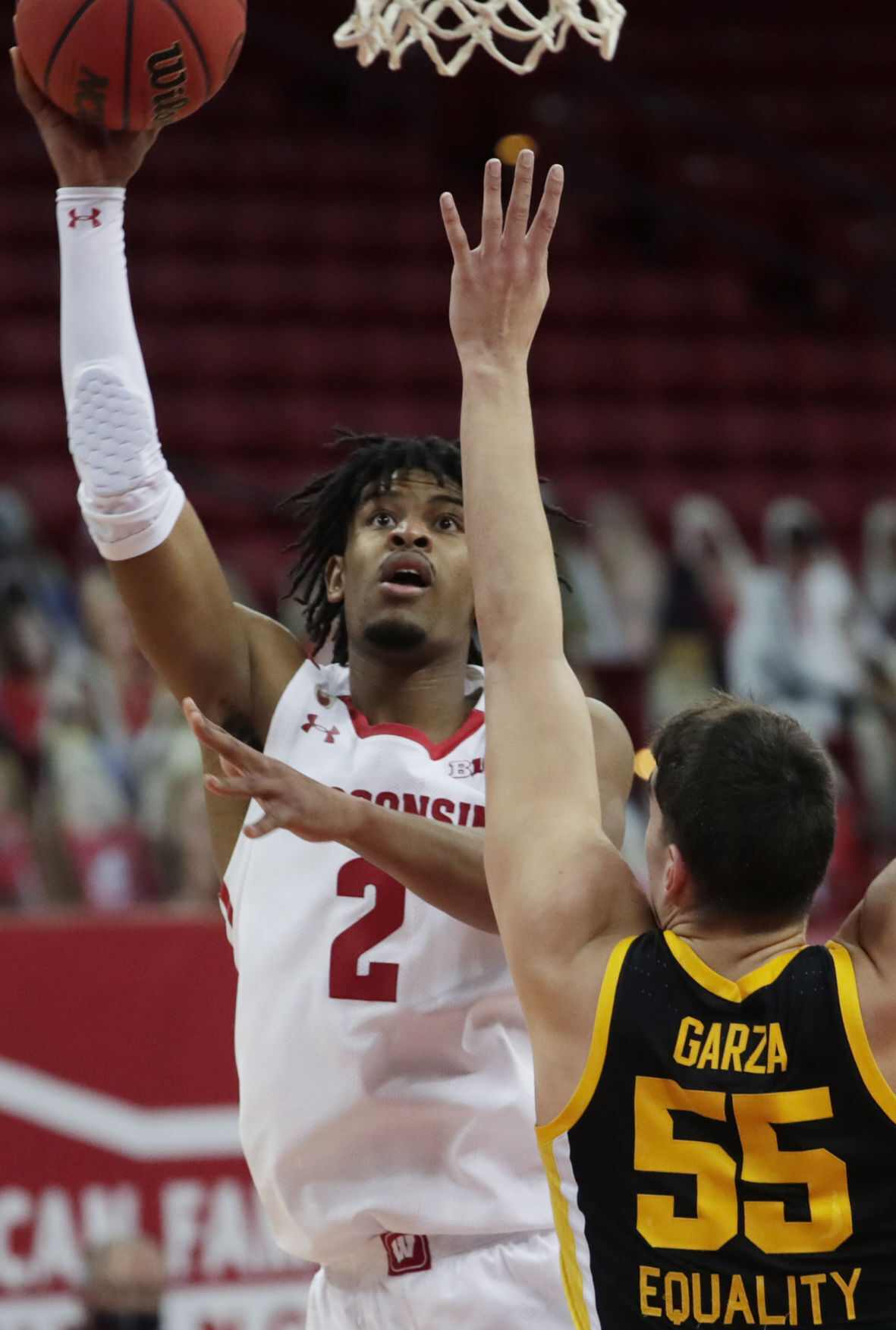 Iowa 77, UW 62